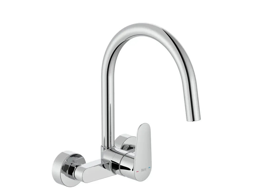 Grifo monomando de cocina con caño giratorio instalado sobre fregadero, modelo Victoria Plus de Roca