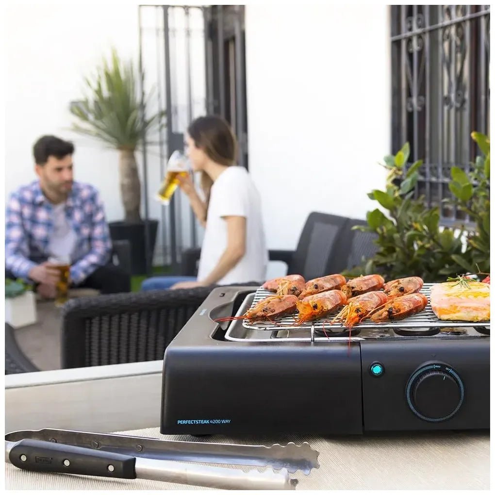 cecotec_03048_barbacoa_eléctrica_de_sobremesa_2400w_con_parrilla_ajustable_de_acero_inoxidable_4