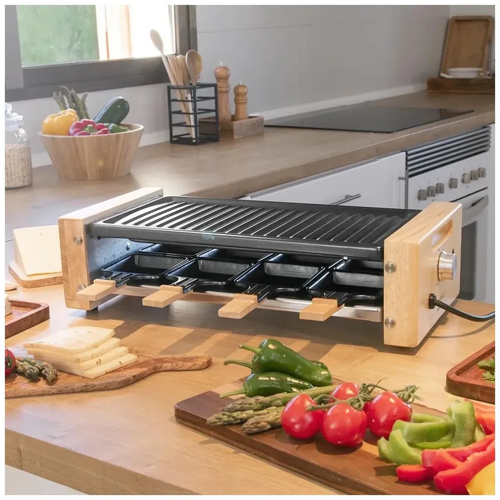 cecotec_03090_raclette_de_madera_1200w:_grill_con_8_sartenes_y_termostato_regulable_2