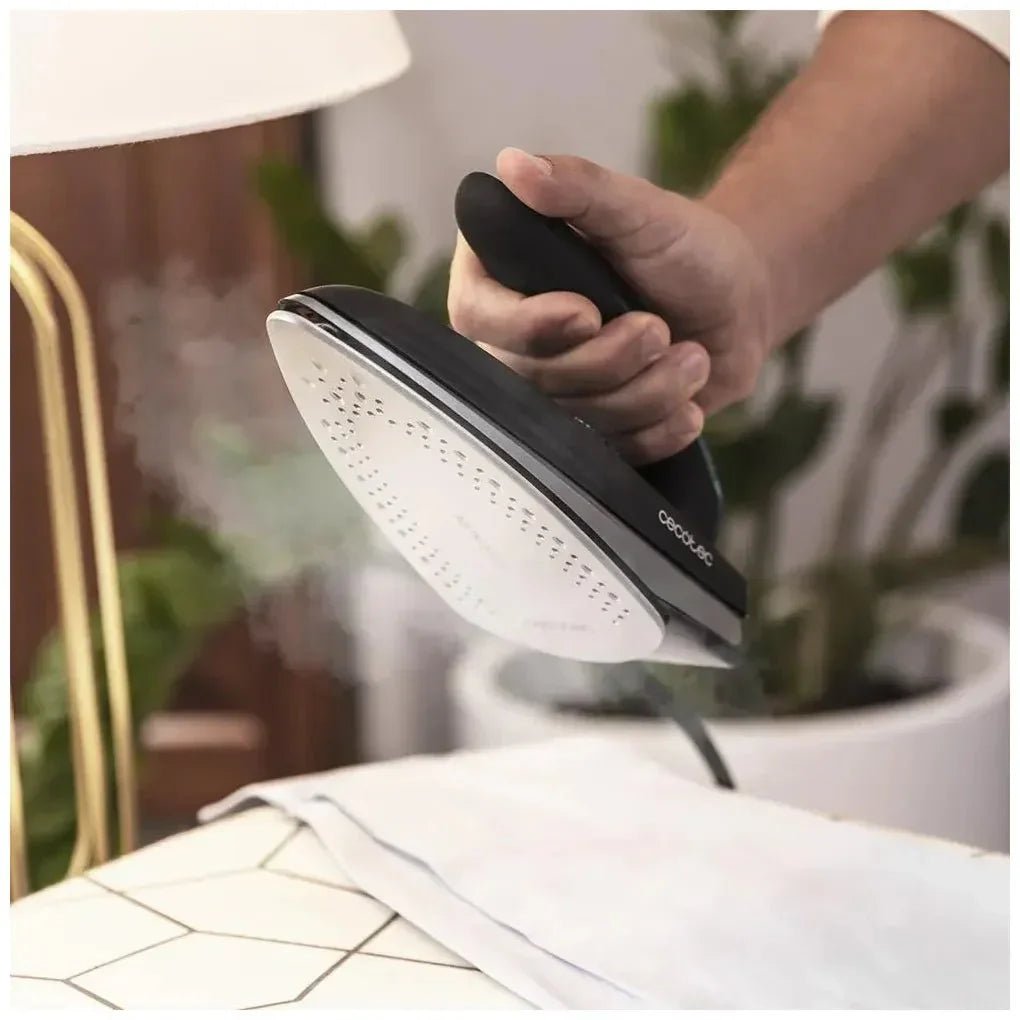 cecotec_05538_plancha_de_viaje_1200w_con_vapor_continuo_y_suela_titanium_slide_para_viajeros_9
