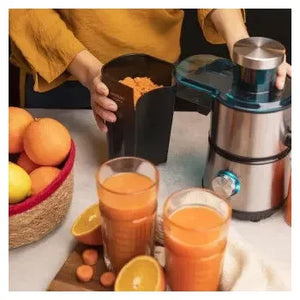 licuadora_de_color_negro_para_frutas_y_verduras_con_depósito_de_pulpa_y_jarra_para_zumo_juice&fresh_400_titan_cecotec_10