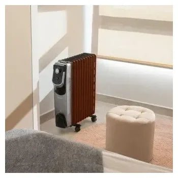 radiador_eléctrico_de_aceite_con_11_módulos_en_color_negro_readywarm_11000_space_360_cecotec_0