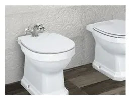 Grifo bimando de caño fijo para bidet con acabado cromado Carmen Roca 1