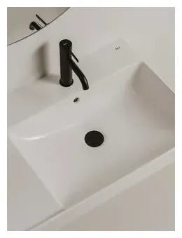 Grifo monocomando caño mezzo de lavabo de latón con acabado negro mate Ona Roca 1