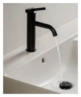 Grifo monocomando de lavabo con diseño circular y acabado negro mate Ona Roca 1