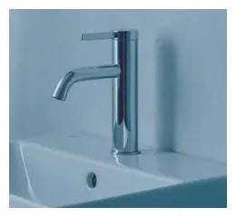 Grifo monocomando para lavabo con diseño circular y acabado cromado de Ona Roca 1