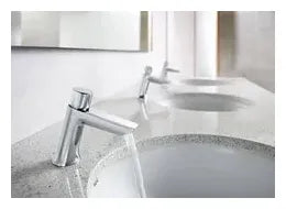 Grifo temporizado de lavabo con pulsador de acabado cromado Instant Eco Roca 2