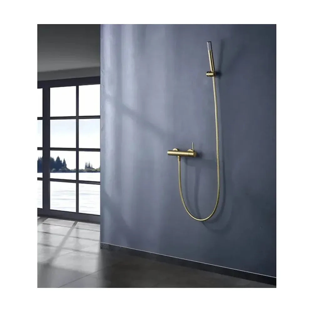 Vista principal de Conjunto de grifo monomando con ducha de mano fabricados en latón con acabado oro cepillado Monza de Imex