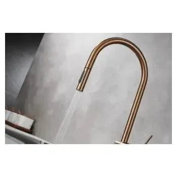 Detalle de acabado y materiales de Grifo de cocina monomando extraíble difusor doble jet de acabado oro rosa cepillado...