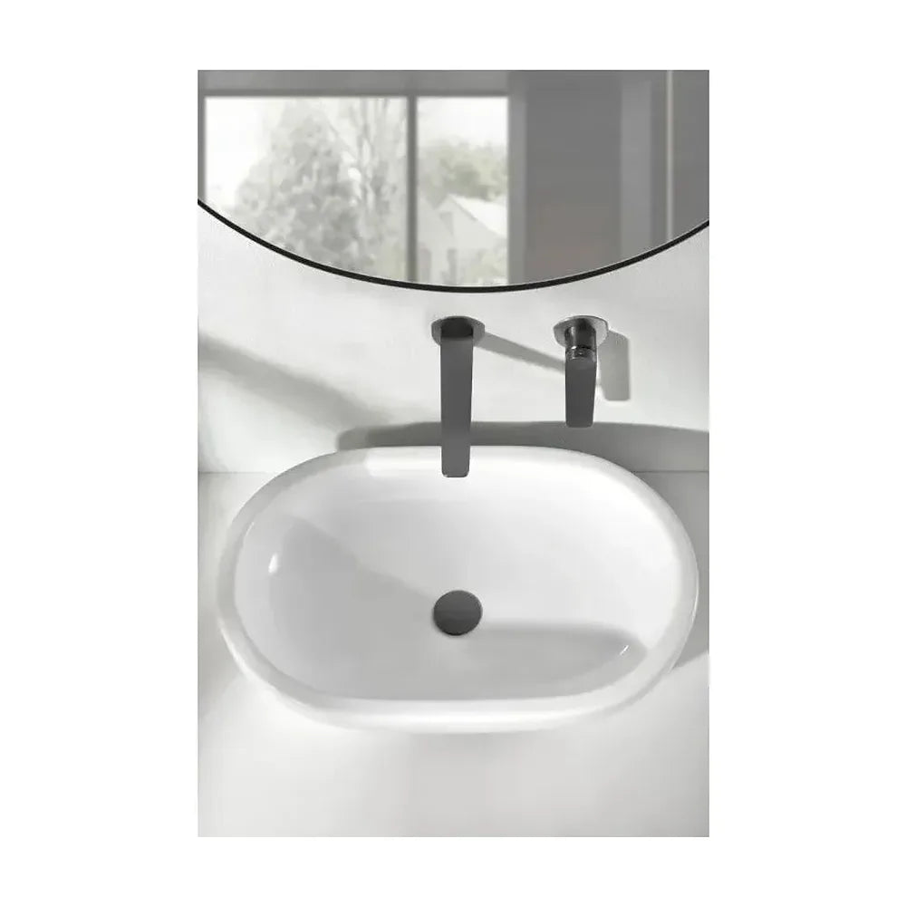 Vista lateral y perspectiva de Grifo monomando empotrado para lavabo hecho de latón con acabado negro metalizado Napoles...