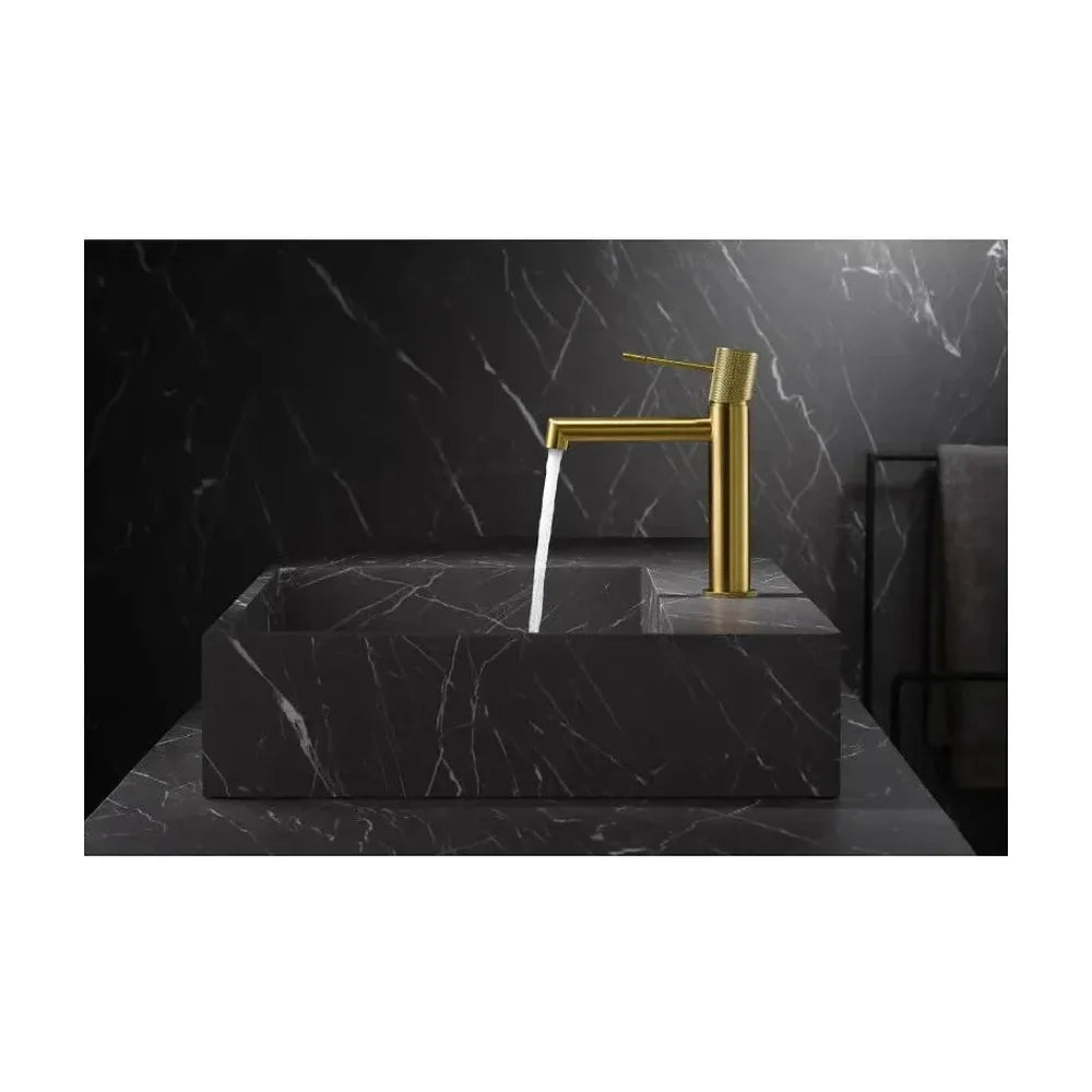 Detalle de funcionamiento de Grifo monomando moderno para lavabo en acabado oro cepillado de Imex