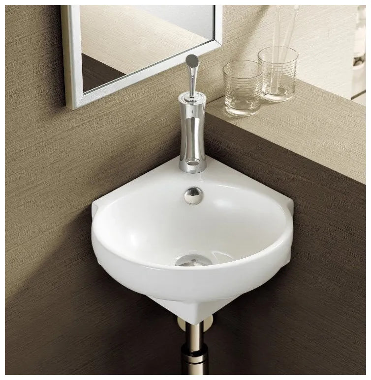 Lavabo suspendido blanco ovalado de cerámica con rebosadero para esquina Mini 39 de Aquore 1