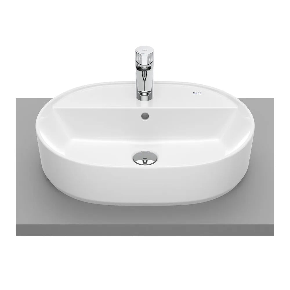 Lavabo sobre encimera fabricado en porcelana blanca de 55x40 cm con rebosadero Round ROCA - Vista 1