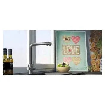 Vista principal de Grifo de cocina de 3 vías con ósmosis y estructura redonda en acero cepillado Nilo de Valaz