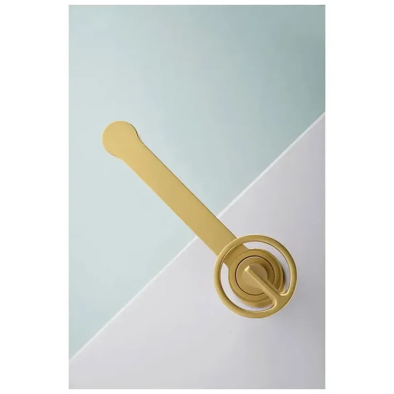 Grifo de lavabo IMEX serie Olimpo de caño alto en acabado oro cepillado