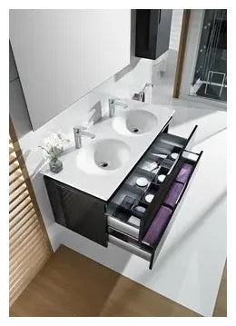 Grifo monomando de lavabo con cuerpo liso y acabado cromado Atlas Roca 1