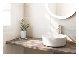 Grifo monomando de lavabo de caño alto con acabado cromado Naia Roca 1