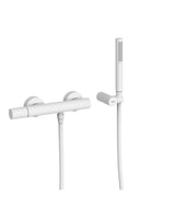 Grifo monomando mural para ducha con ducha de mano anticalcárea acabado blanco mate Study Tres