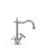 Grifo para lavabo bimando con caño giratorio acabado en acero CLASIC TRES