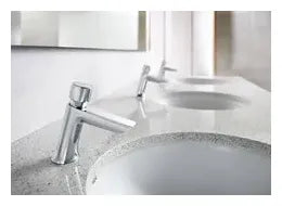 Grifo temporizado de lavabo con pulsador de acabado cromado Instant Eco Roca 1