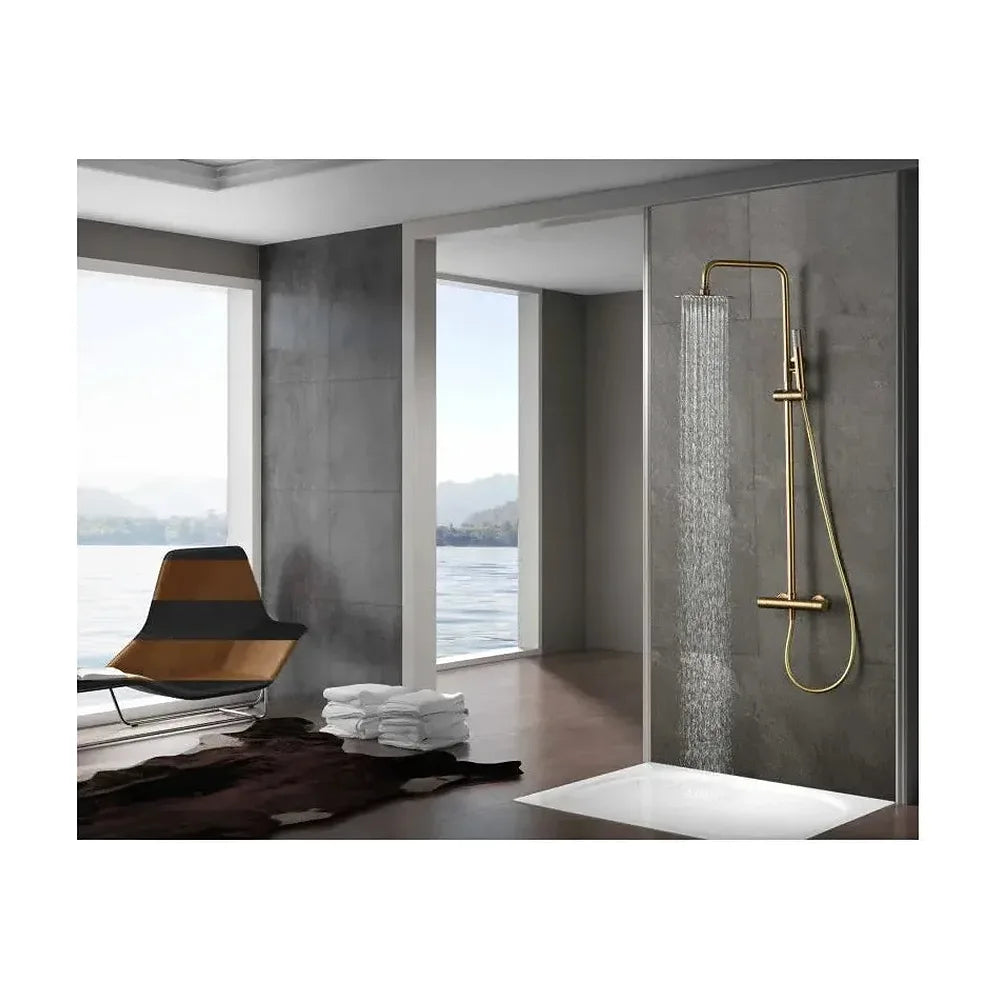 Vista principal de Columna de ducha con grifo termostático acero inoxidable y latón acabado en oro cepillado Monza de Imex