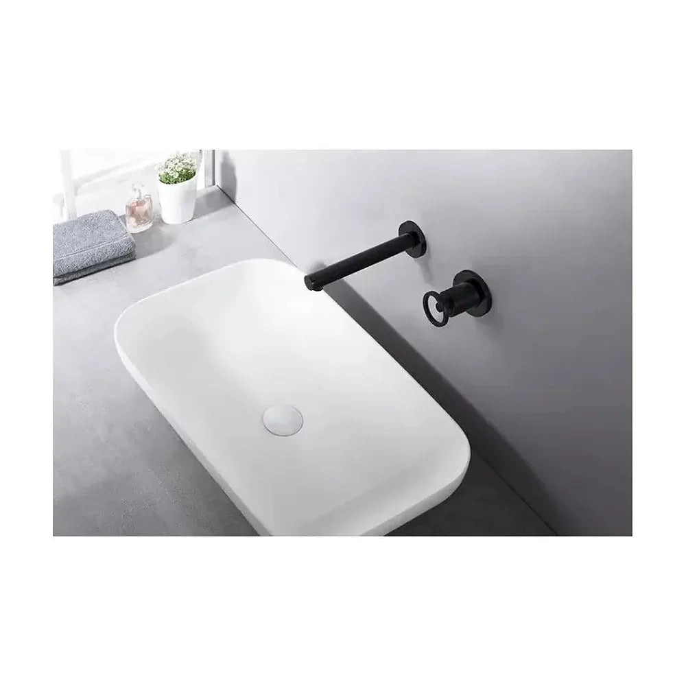 Vista lateral y perspectiva de Grifo de lavabo empotrado con un diseño monomando de acabado negro mate Olimpo de Imex