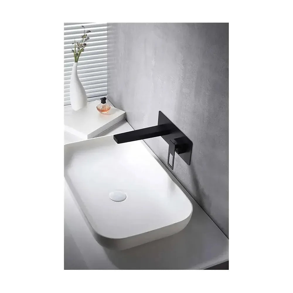 Vista lateral y perspectiva de Grifo de lavabo monomando de instalación empotrada y de acabado negro mate Suecia de Imex