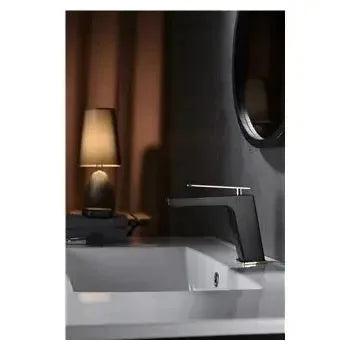 Vista principal de Grifo monomando para lavabo fabricado en latón negro y oro con un caño recto Suecia de Imex