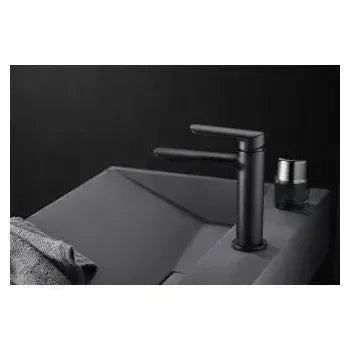 Vista lateral y perspectiva de Grifo monomando para lavabo negro mate equipado con un cartucho cerámico de 35 mm Ural de Imex