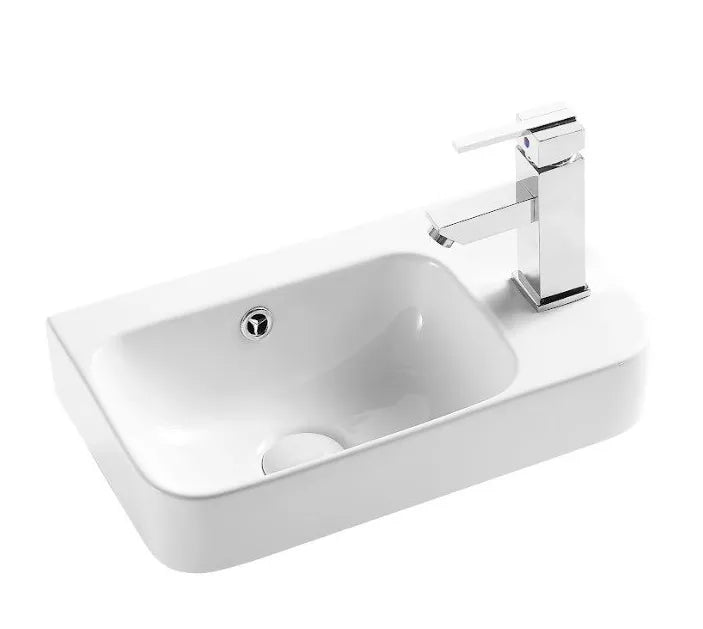 Lavabo suspendido blanco rectangular de cerámica con rebosadero y anclaje a pared Mini 28 R de Aquore 0