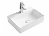 Lavabo suspendido de cerámica blanca con bordes finos y curvos con orificio para grifería Kube 46 M de Aquore