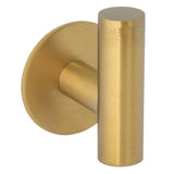 Percha diseño minimalista con acabado oro mate y protección PVD adhesiva sin taladro de Valaz