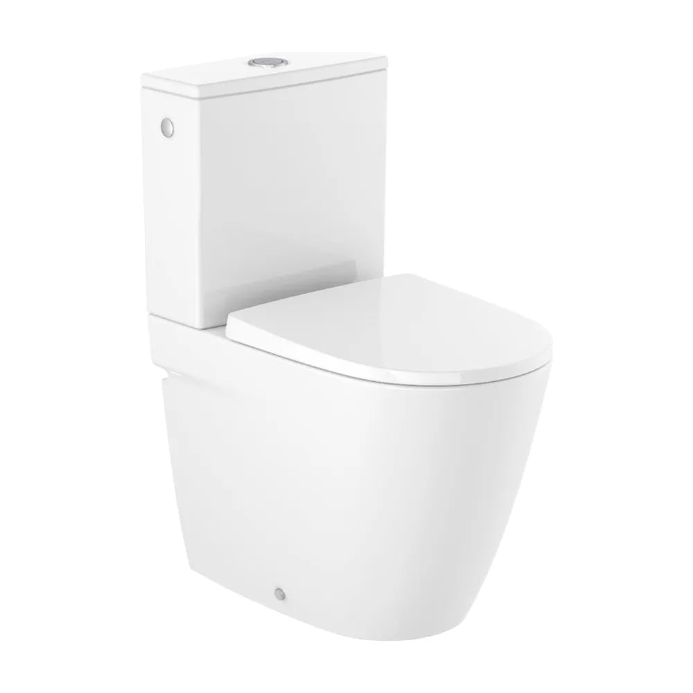 Inodoro tanque bajo con salida dual adosado a pared de color blanco Rimless Ona Roca - Vista 1