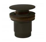 Válvula de desagüe para lavabo con sistema click clack fabricada en latón con acabado negro bronce TRES